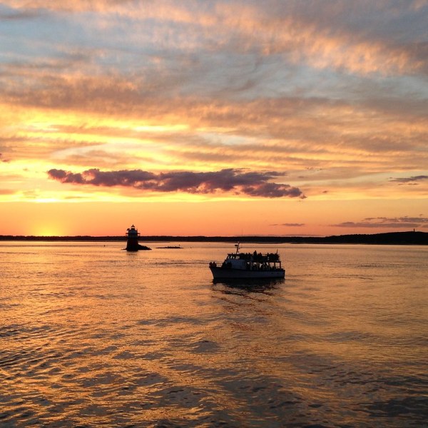 a sunset over a body of water