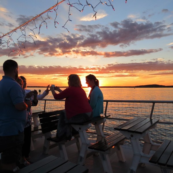 a group of people looking at a dock
