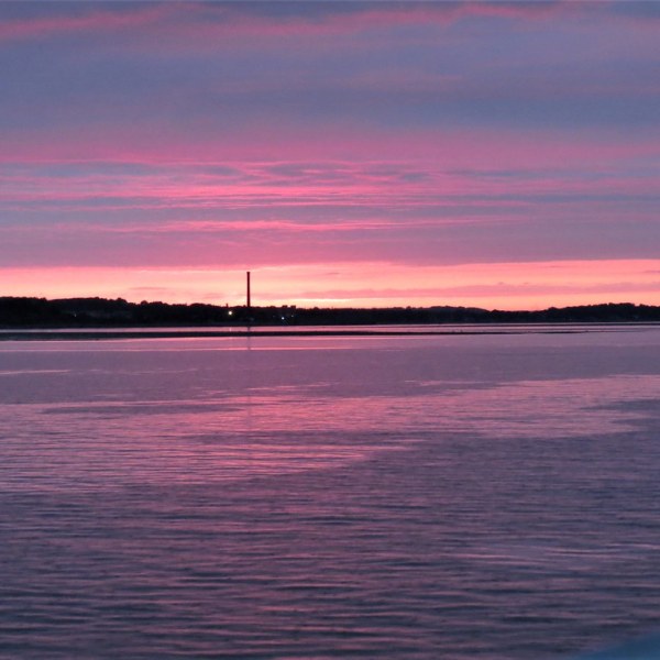 a sunset over a body of water