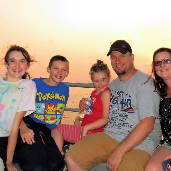 a group of people posing for the camera