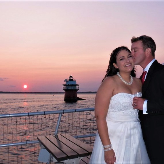 a person standing in front of a body of water