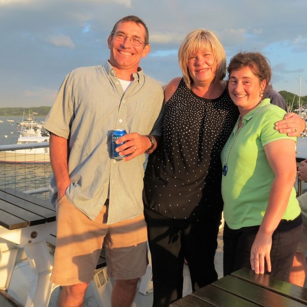 a group of people posing for the camera
