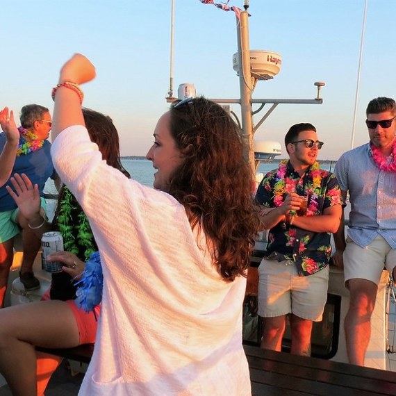 a couple of people that are standing in the water