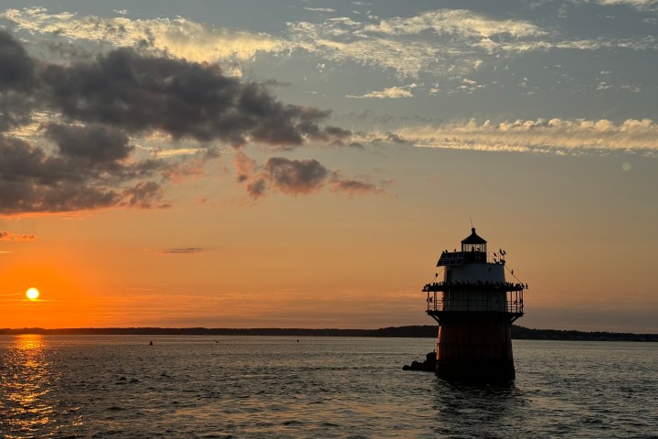 a sunset over a body of water